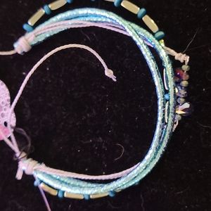 teal multi strand tug and pull bracelet